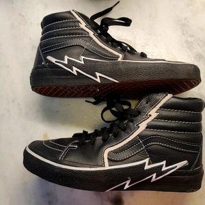 Black Vans high top with lightning bolts